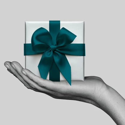 Gratis QMS Toilettas bij 4 Travel Sizes twv 100 euro